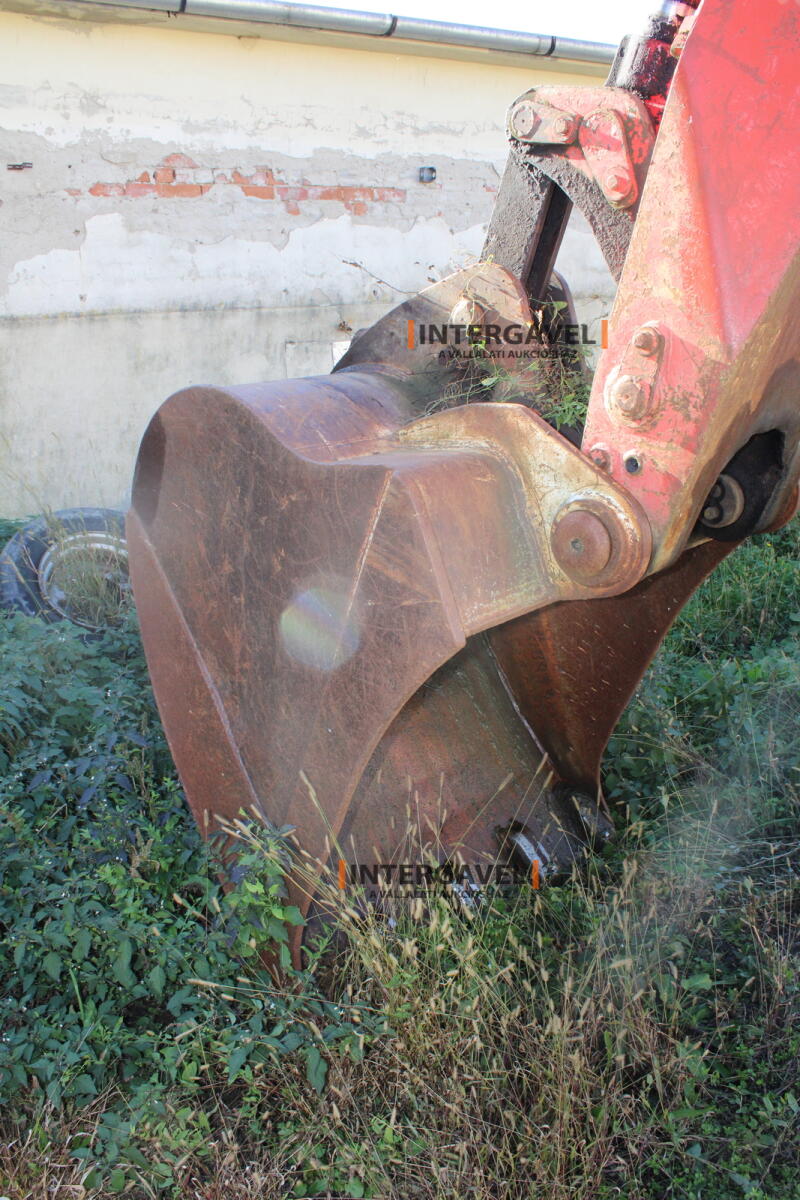 Gumikerekes forgó kotró - O&K 21